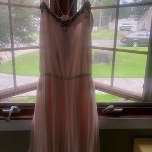 Pale pink pelted and jeweled dress